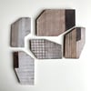 Intersection - a group of Section wall sculptures