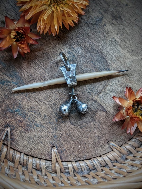 Image of Bells on her Quills