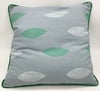 White and green leaf cushion