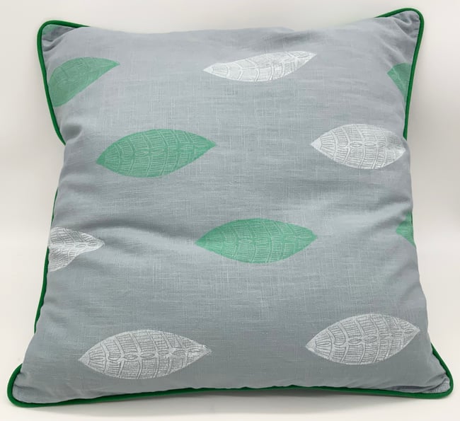 White and green leaf cushion