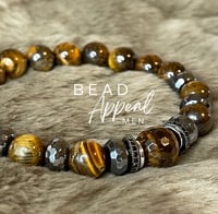 Image 1 of Tiger Eye Me Please