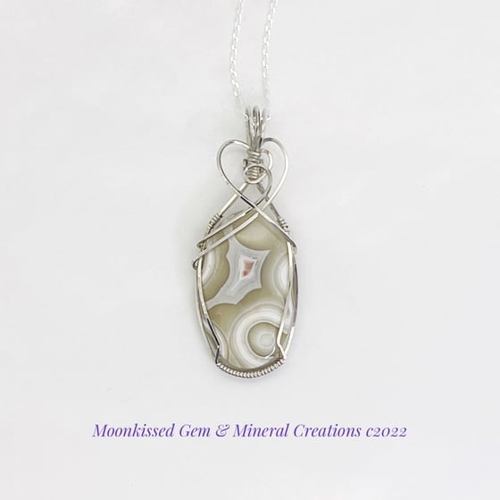 Image of Crazy Lace Cabochon Sterling Silver Wirewrapped Pendant