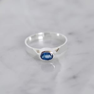 Image of Blue Kyanite oval cut flat band silver ring