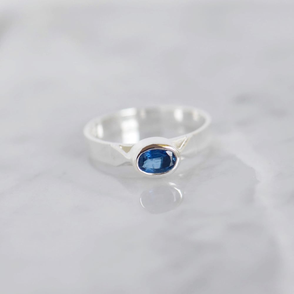 Image of Blue Kyanite oval cut flat band silver ring