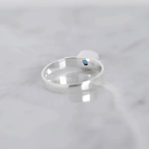 Image of Blue Kyanite oval cut flat band silver ring
