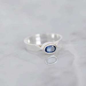 Image of Blue Kyanite oval cut flat band silver ring