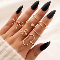 Image 1 of 7 PIECE BOW RING SET