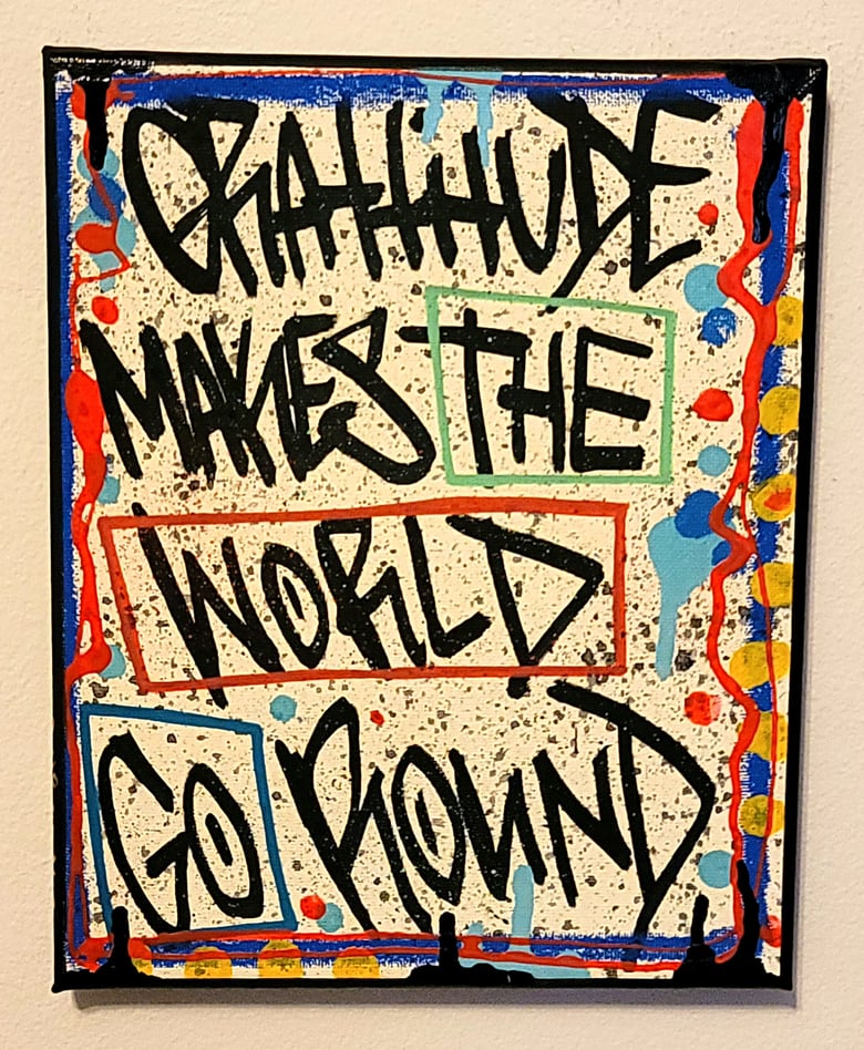 Image of "Grattitude Makes The World Go Round"