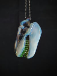 Image 3 of Mirage T-Rex skull pendant with illuminati teeth. 