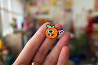Image of Lil Orange Nose Licker Pin