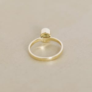 Image of Tanzania Yellowish Green Sapphire 10k gold flat band ring