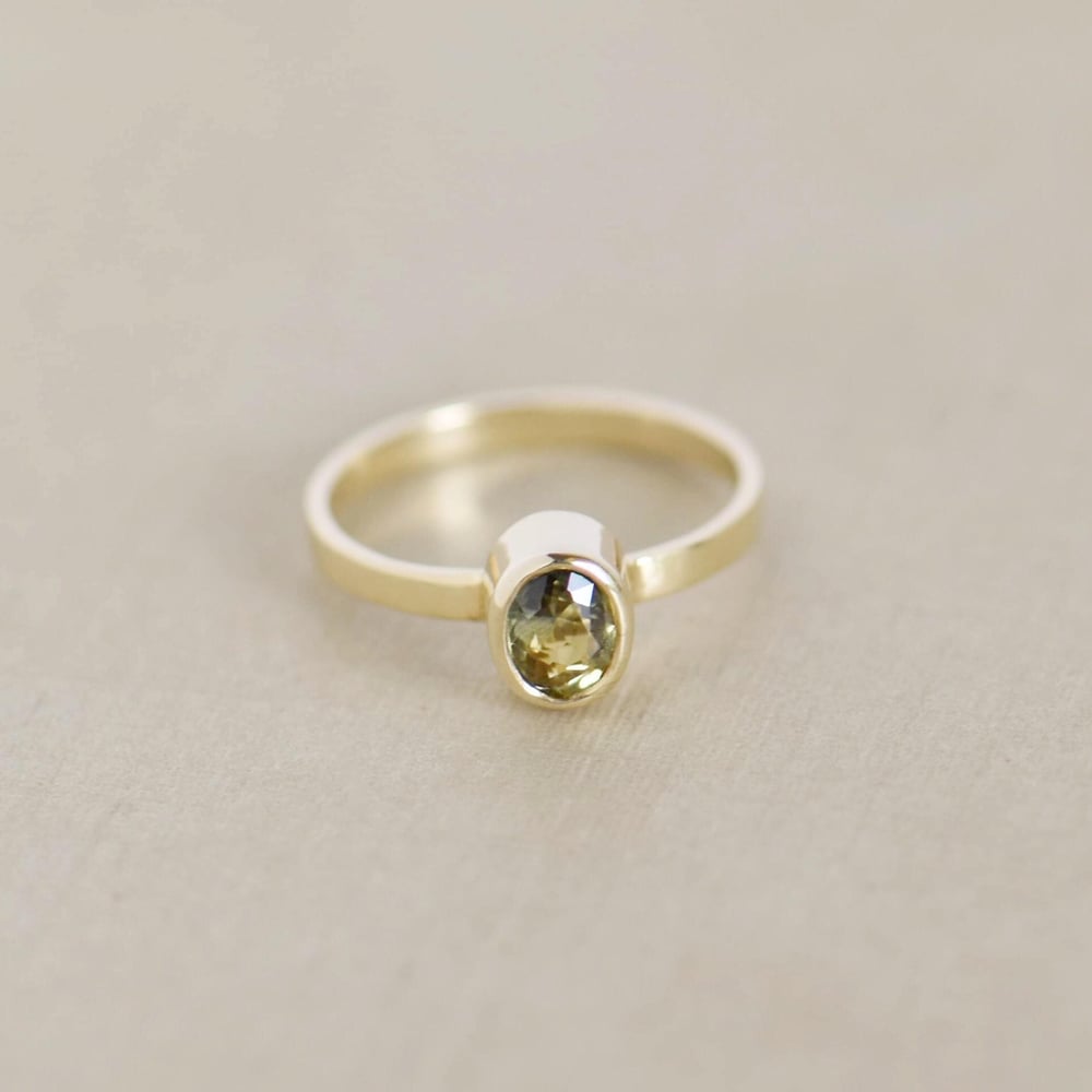 Image of Tanzania Yellowish Green Sapphire 10k gold flat band ring