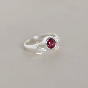 Image of Hands of Love x Red Garnet round star cut silver ring