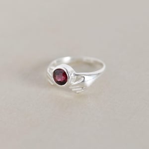 Image of Hands of Love x Red Garnet round star cut silver ring