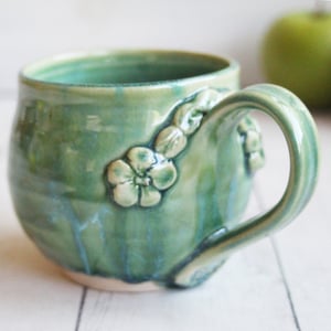 Image of Shimmering Green Pottery Mug with Floral Details, Coffee Cup 13 oz., Made in USA