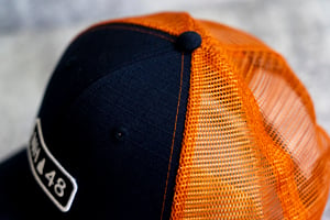 Image of NH 48 - Dark Navy/Orange Trucker Hat