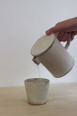 Image of "poem for a jug" | coffee pot