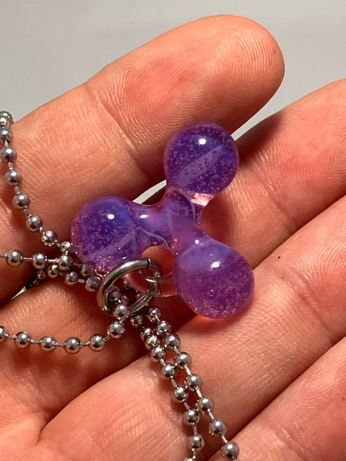 Image of opaline purple trefoil