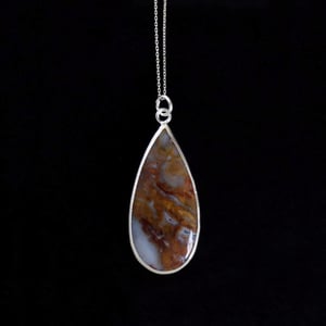 Image of Red Palm Root Agate cabochon pear shape silver necklace