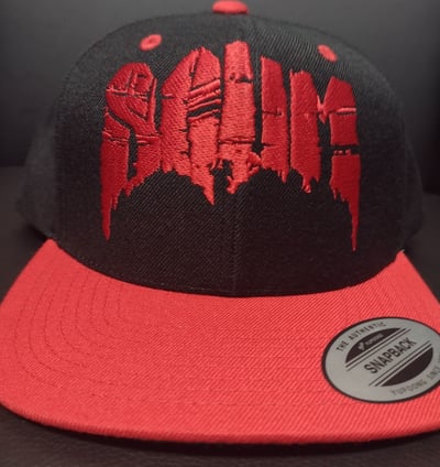 Image of SCUM : RED BROKEN SCUM LOGO SNAPBACK HAT W/ RED LSP LOGO ON THE BACK