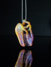 Image 3 of Silver haze T-Rex skull pendant with stargazer teeth.