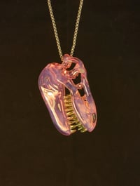 Image 3 of Yoshi (CFL) T-Rex skull pendant with illuminati (UV) teeth