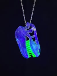 Image 4 of Yoshi (CFL) T-Rex skull pendant with illuminati (UV) teeth