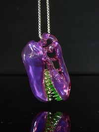 Image 1 of Stargazer T-Rex skull pendant with illuminati (UV) teeth 💜💚