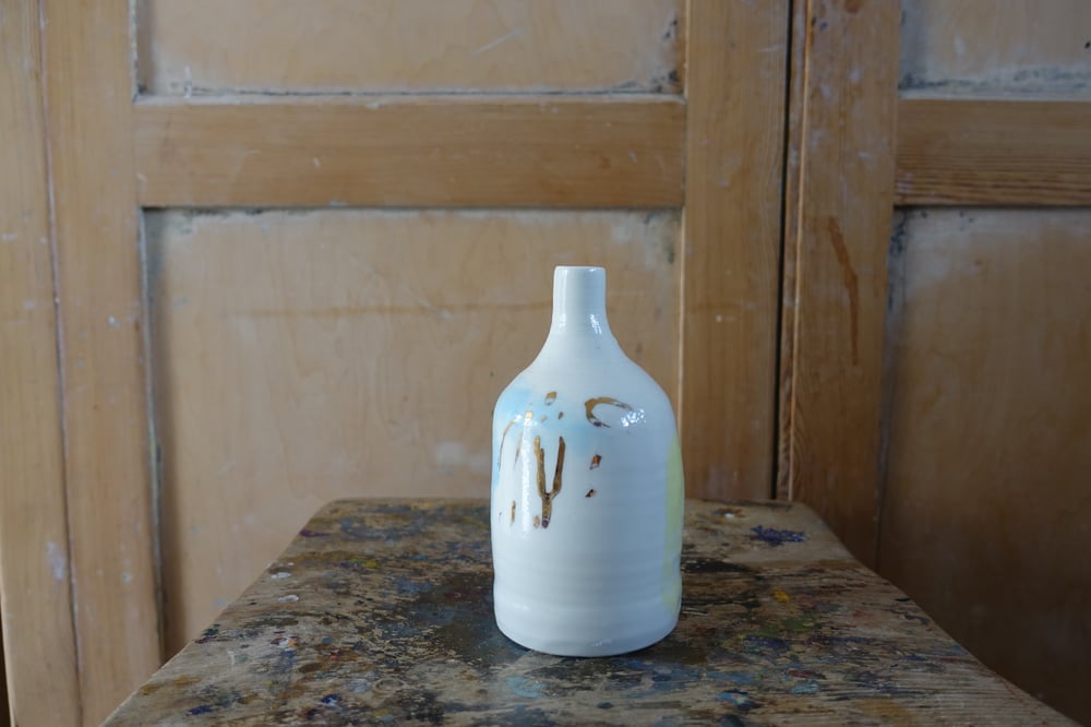 Image of Porcelain bottle with gold lustre and pink glaze