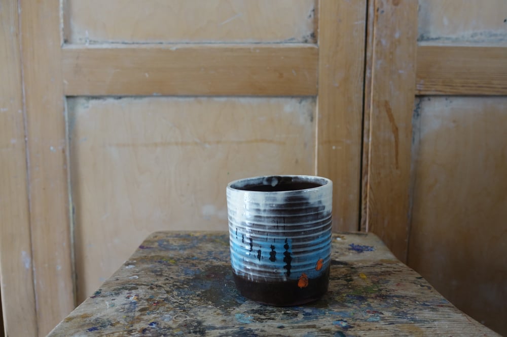 Image of Earthenware beaker decorated with slips (beachscape)