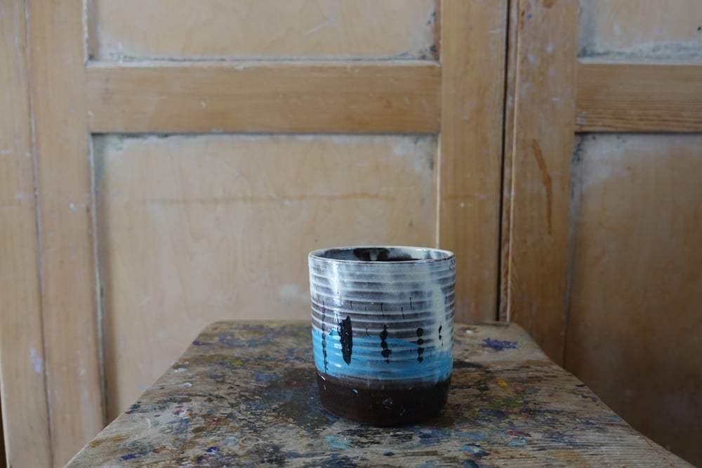 Image of Earthenware beaker decorated with slips (beachscape)