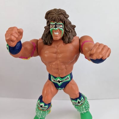 Image of Custom painted Ultimate Warrior wwf wwe hasbron action figure