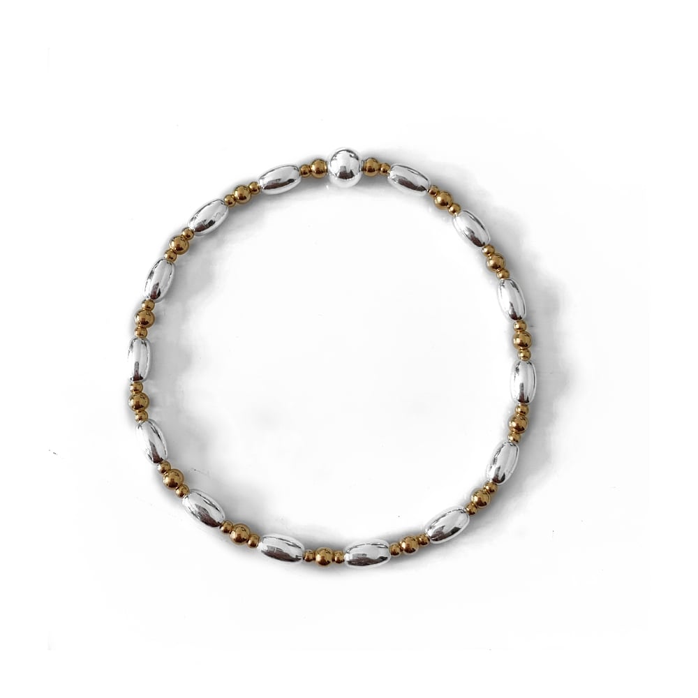 Image of Sterling Silver & Gold oval bead stacking bracelet 