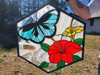 Image of Stained glass butterfly and hibiscus flowers