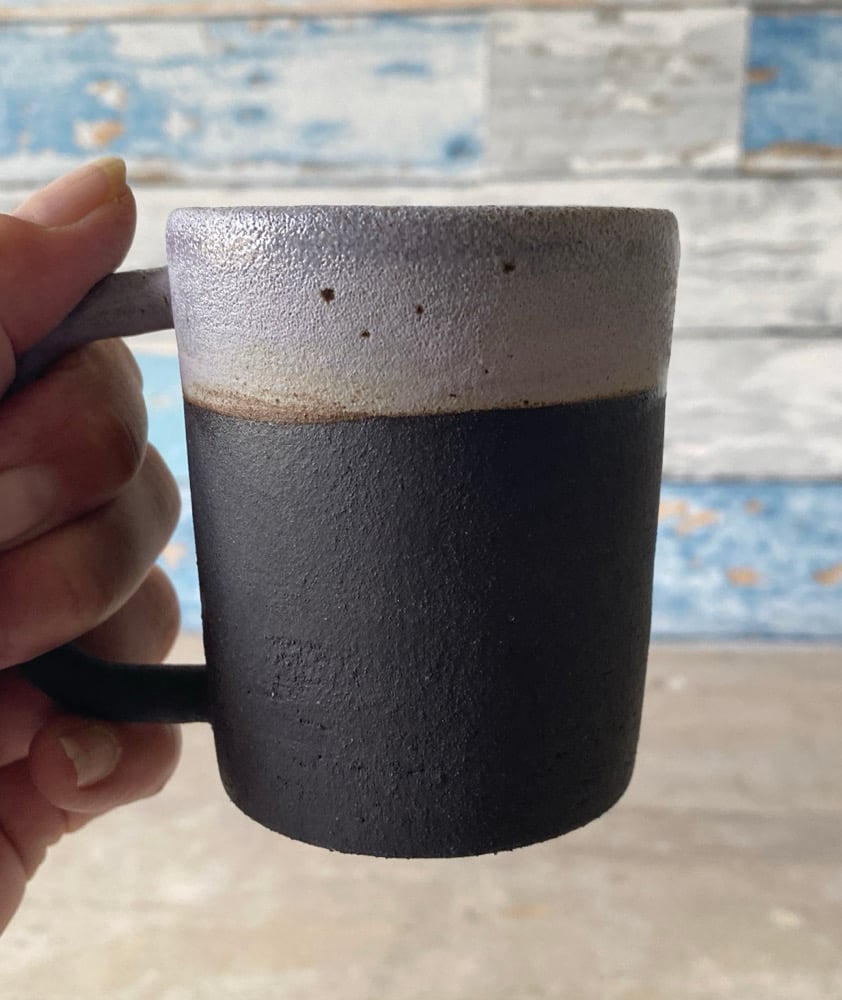 Burnt lavendar black clay.