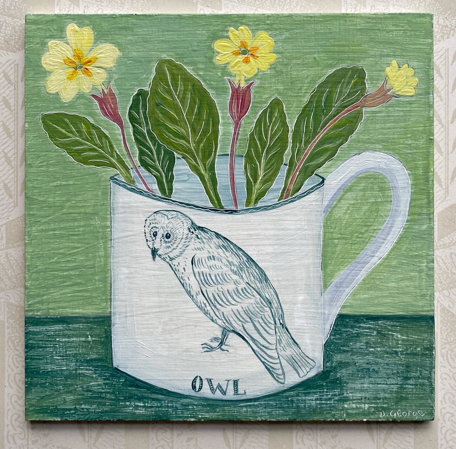 Image of Miniature owl cup and primroses 