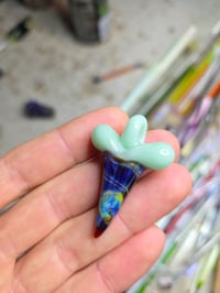 Image 3 of Glass shark tooth pendant.