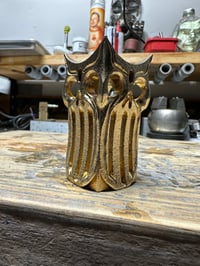 Image 3 of Four Skull Brass Cigar Holder