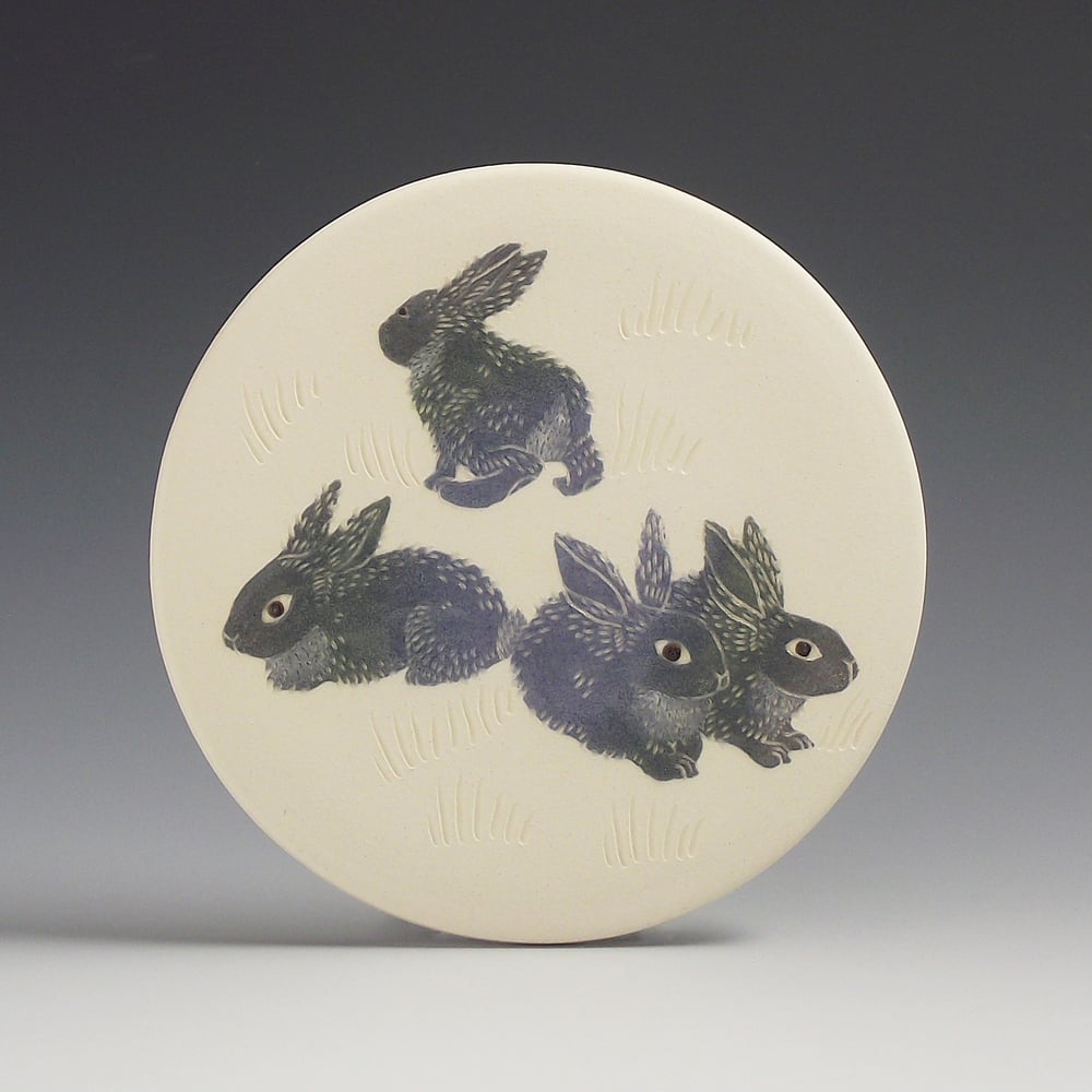 Image of Four bunnies ceramic wall hanging 
