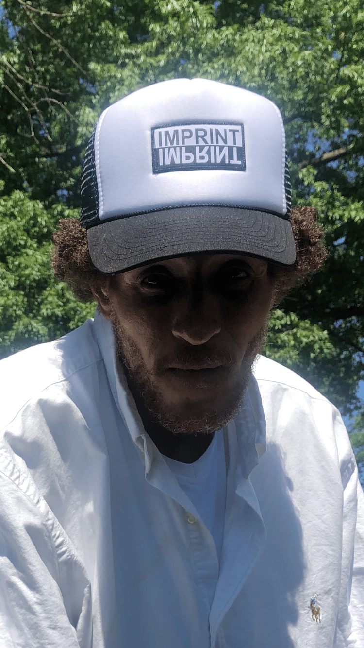 Image of Back and White Imprint Trucker Cap