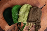 Image 1 of Newborn openwork bonnet green colours