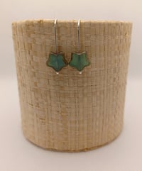 Green star earrings