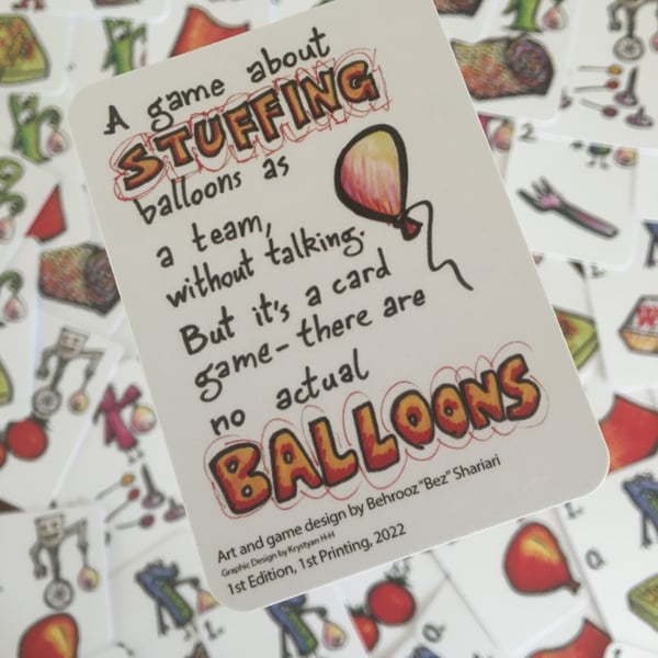 Image of AGA stuffing balloons as a team, without talking. But it's a card game-there are no actual balloons.