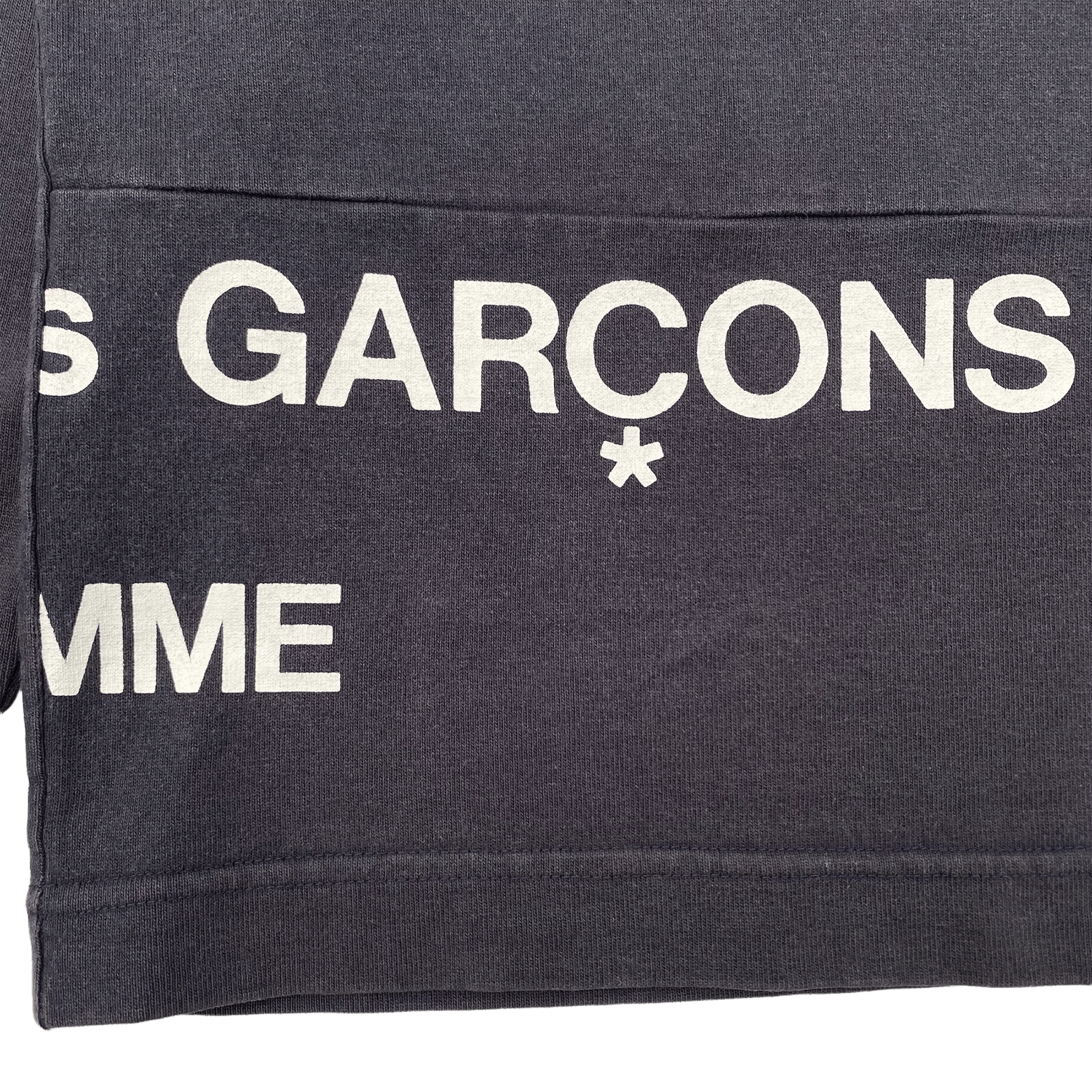 Comme des 2024 garcons split logo