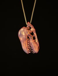 Image 5 of Fully cfl reactivecT-Rex skull pendant made with yoshi and mirage