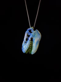 Image 2 of Fully UV reactive T-Rex skull pendant made with glopal and illuminati.