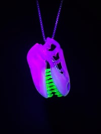 Image 4 of Fully UV reactive T-Rex skull pendant made with glopal and illuminati.