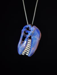 Image 2 of Opalescent T-Rex skull pendant (CFL reactive)