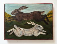 Prancing Hares on the moors