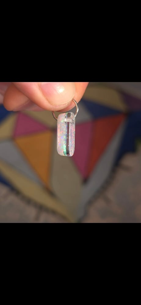 Image of Dichropal capsule charm 